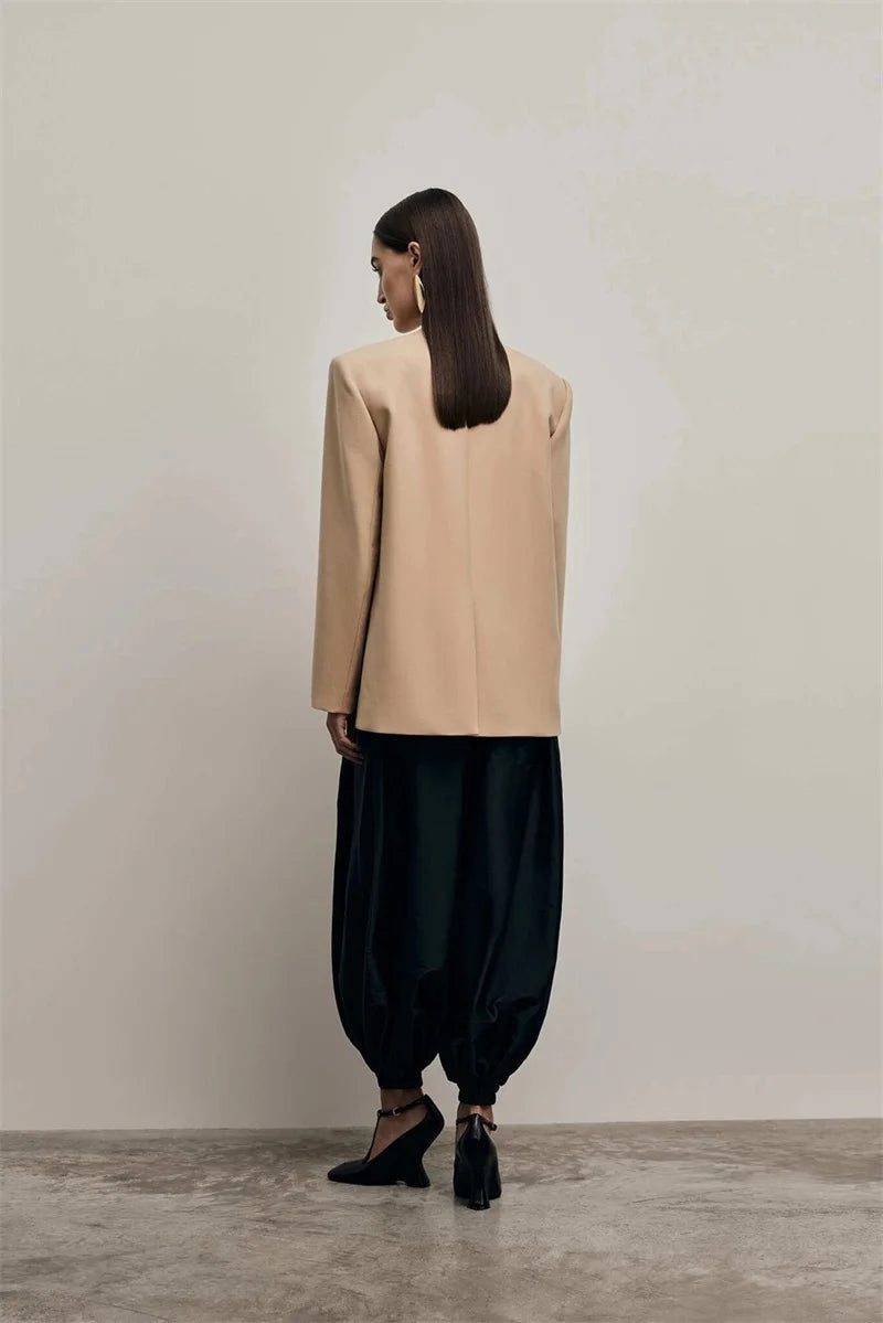 Amberkleurige blazer met diepe V-hals