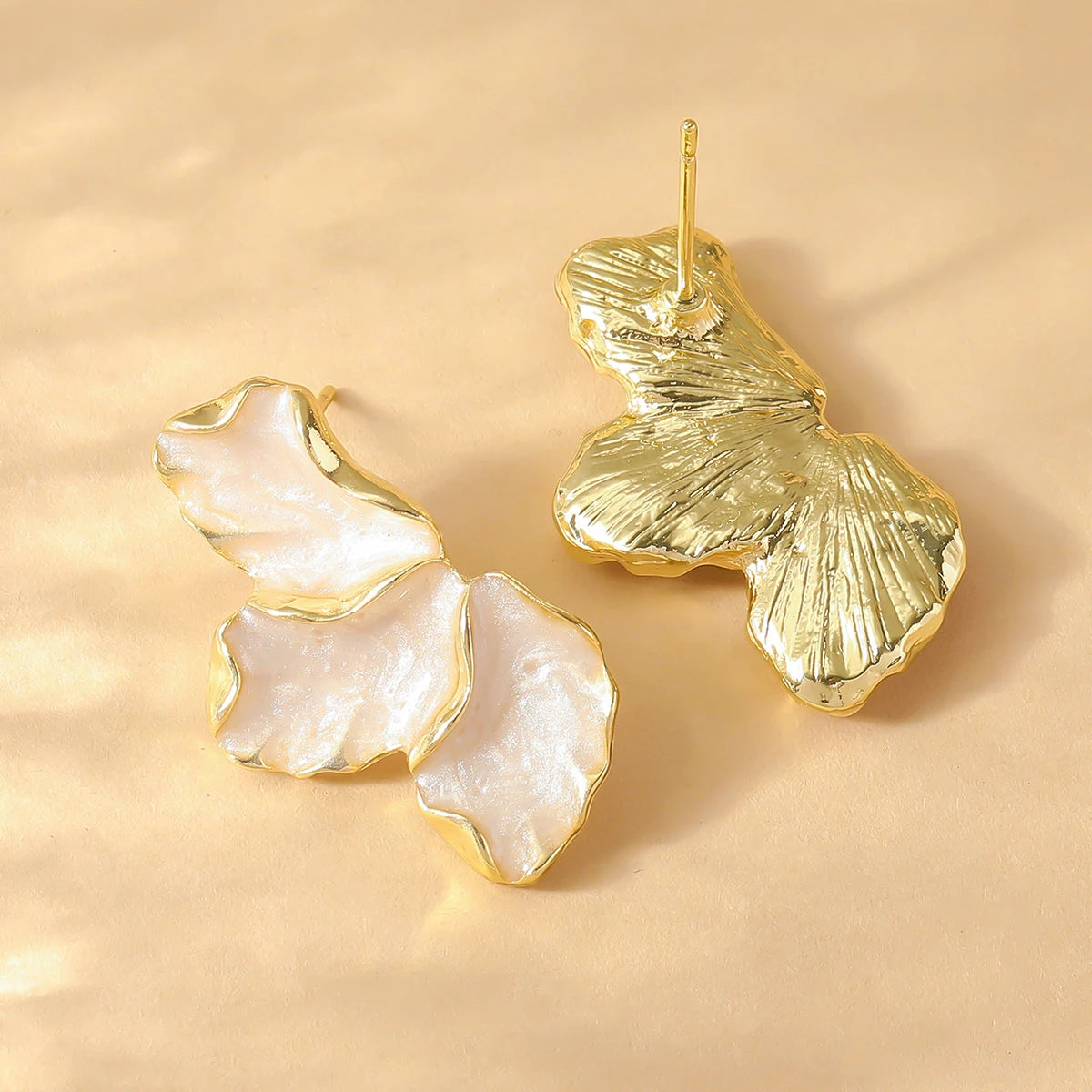 Forest Maple Leaf Earrings — earrings in pink — back view