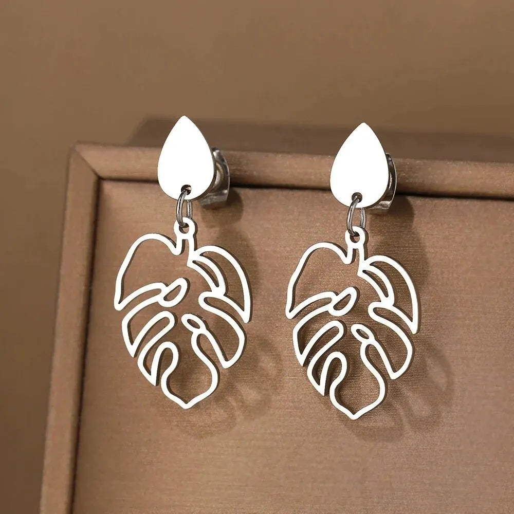 Metal Leaves Drop Earrings — earrings in gold — additional view