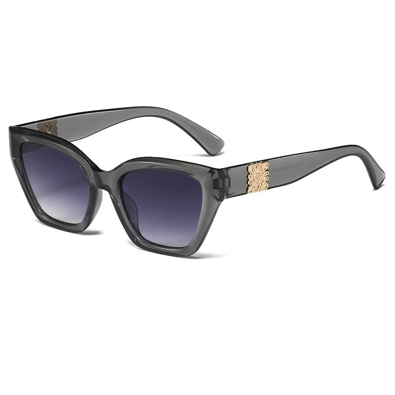 Sunglasses with gray frame and blue gradient lenses on a white background