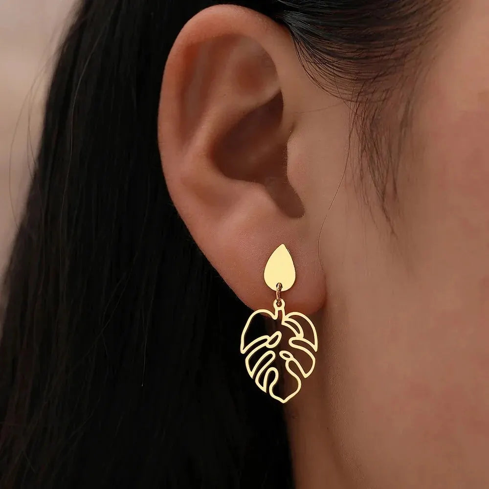 Metal Leaves Drop Earrings — earrings in gold — back view