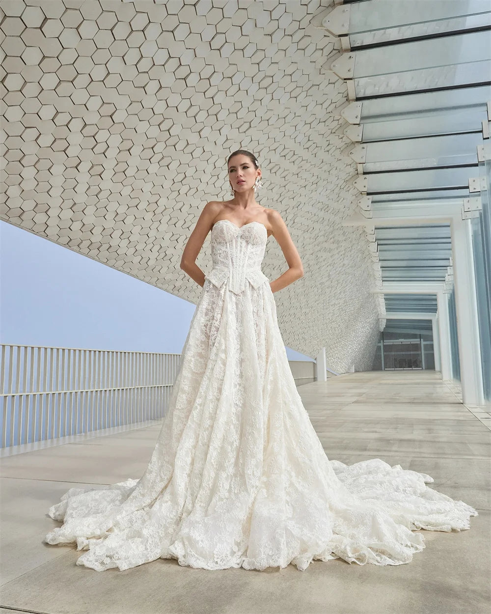 Seraphine Puff-Sleeve Lace A-Line Bridal Gown — wedding dresses in white lace detail — back view