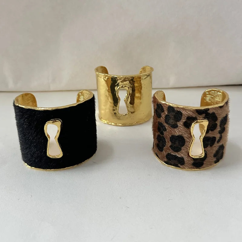 Keyhole Open Cuff Bracelet — bracelets in gold — back view