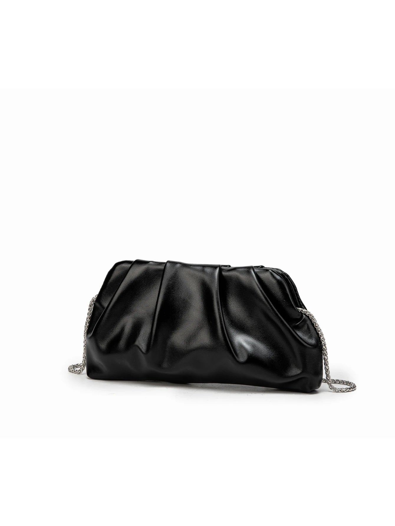 Woman carrying Anna chain shoulder bag, styling demonstration