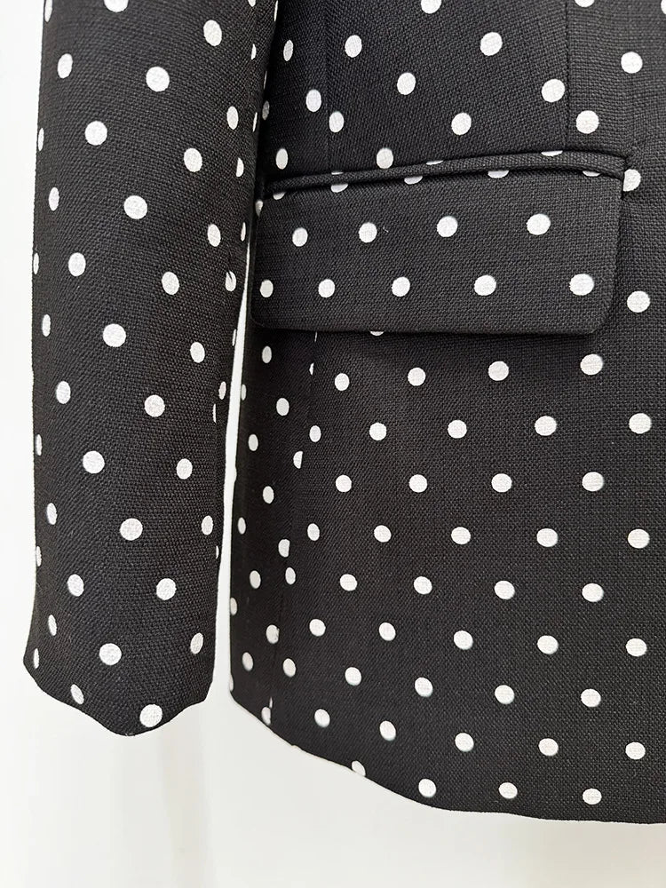 Black blazer with white polka dots on a white background
