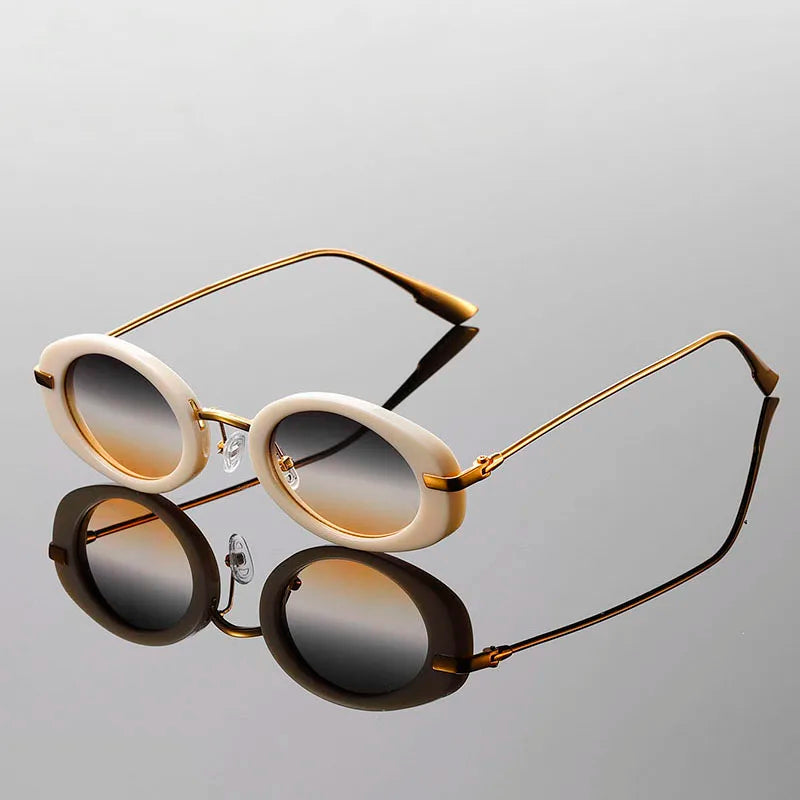 Side profile of beige retro round sunglasses showing neutral tone