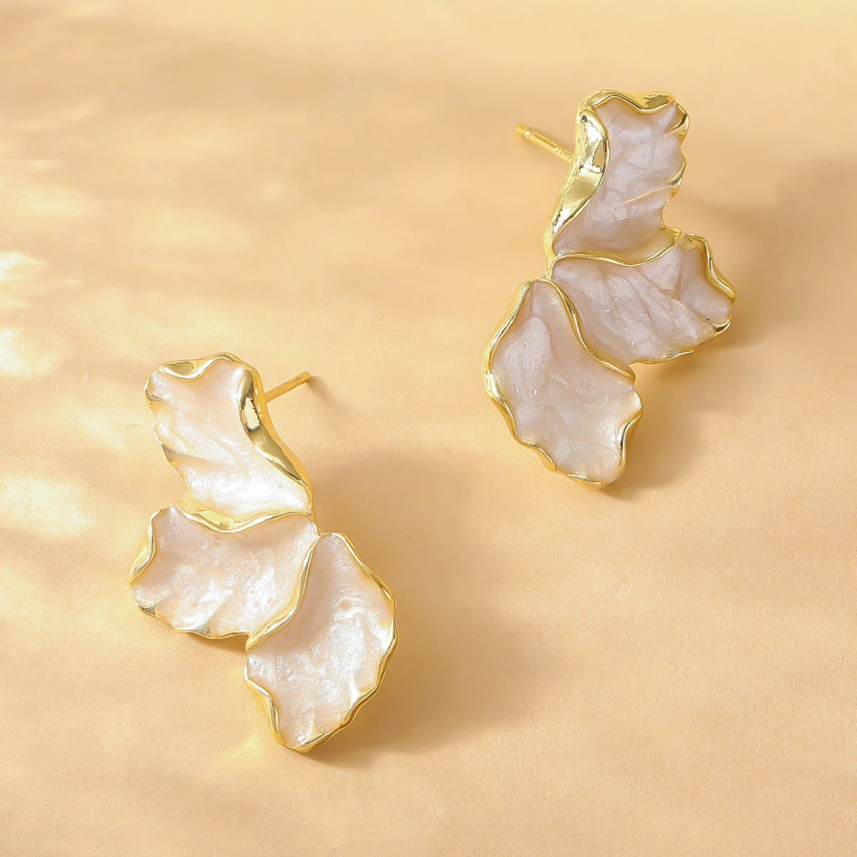 Forest Maple Leaf Earrings — earrings in blue — close-up detail