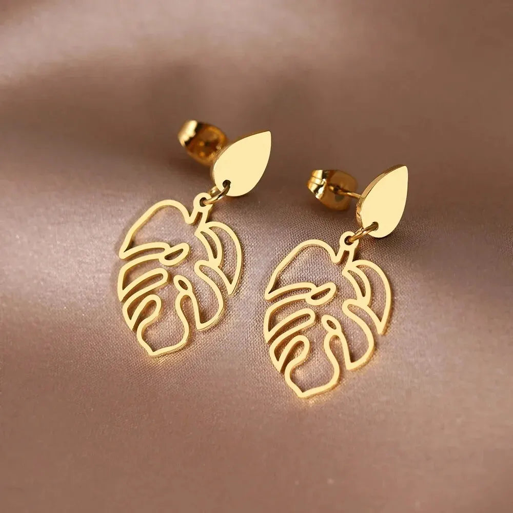 Metal Leaves Drop Earrings — earrings in gold — front view