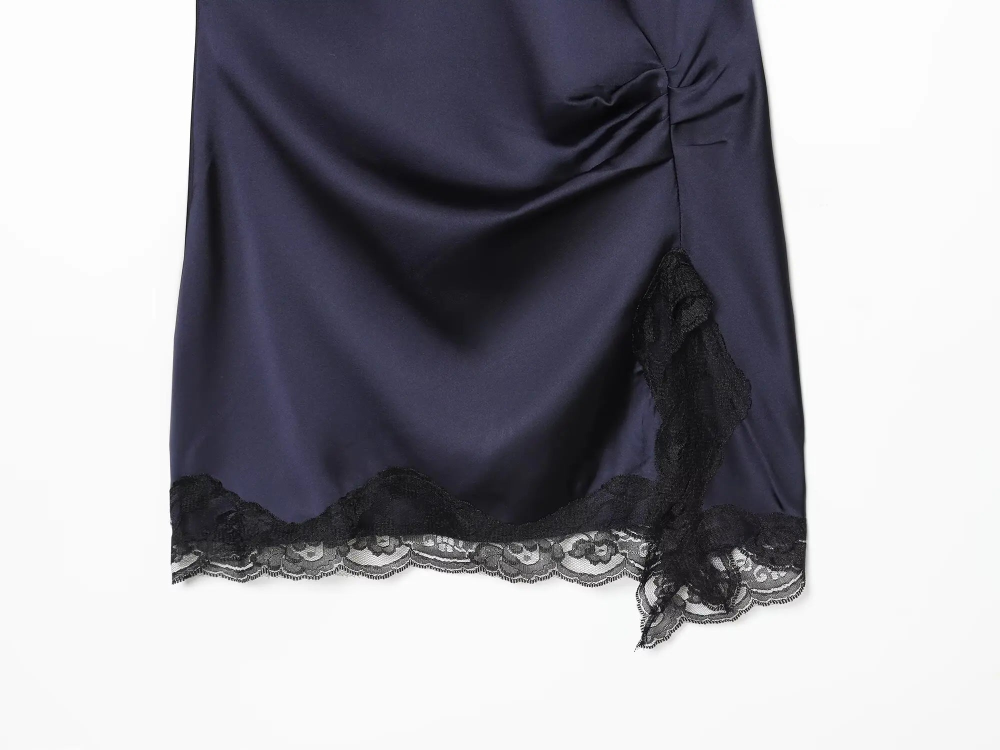 Navy sleeveless dress with lace trim on a white background
